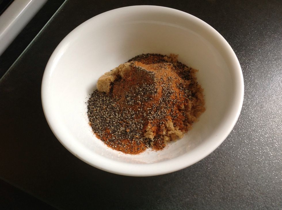 In a Bowl Combine Brown Sugar, Smoked Paprika, Cajun Spice Blend, and Ground Black Pepper