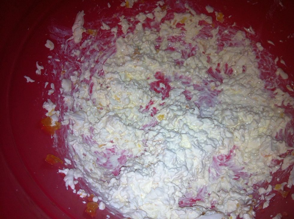 In a bowl, combine cream cheese, orange juice, and orange marmalade to taste and using a mixer, blend to a creamy consistency. Should taste citrusy and refreshing.