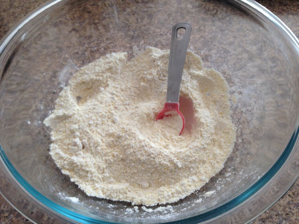 In a bowl, combine the dry ingredients: flour, cornmeal, sugar, baking powder, salt, and baking soda.