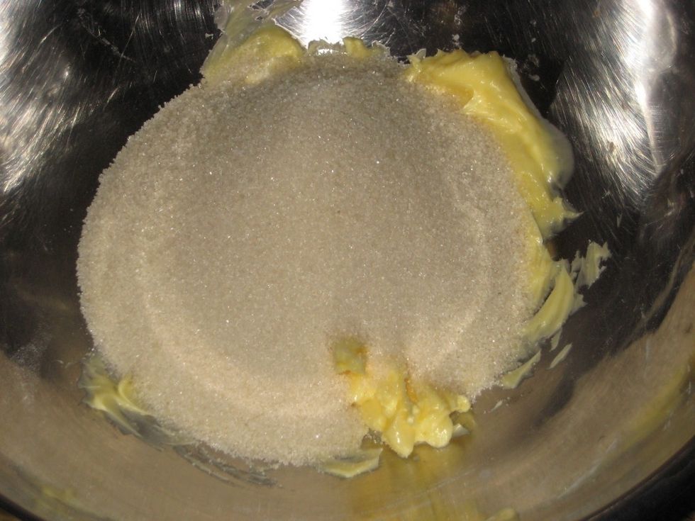 In a bowl combine the sugar and softened butter. To soften you can pop the butter in the microwave for about 15 seconds(depending on how hard it is)