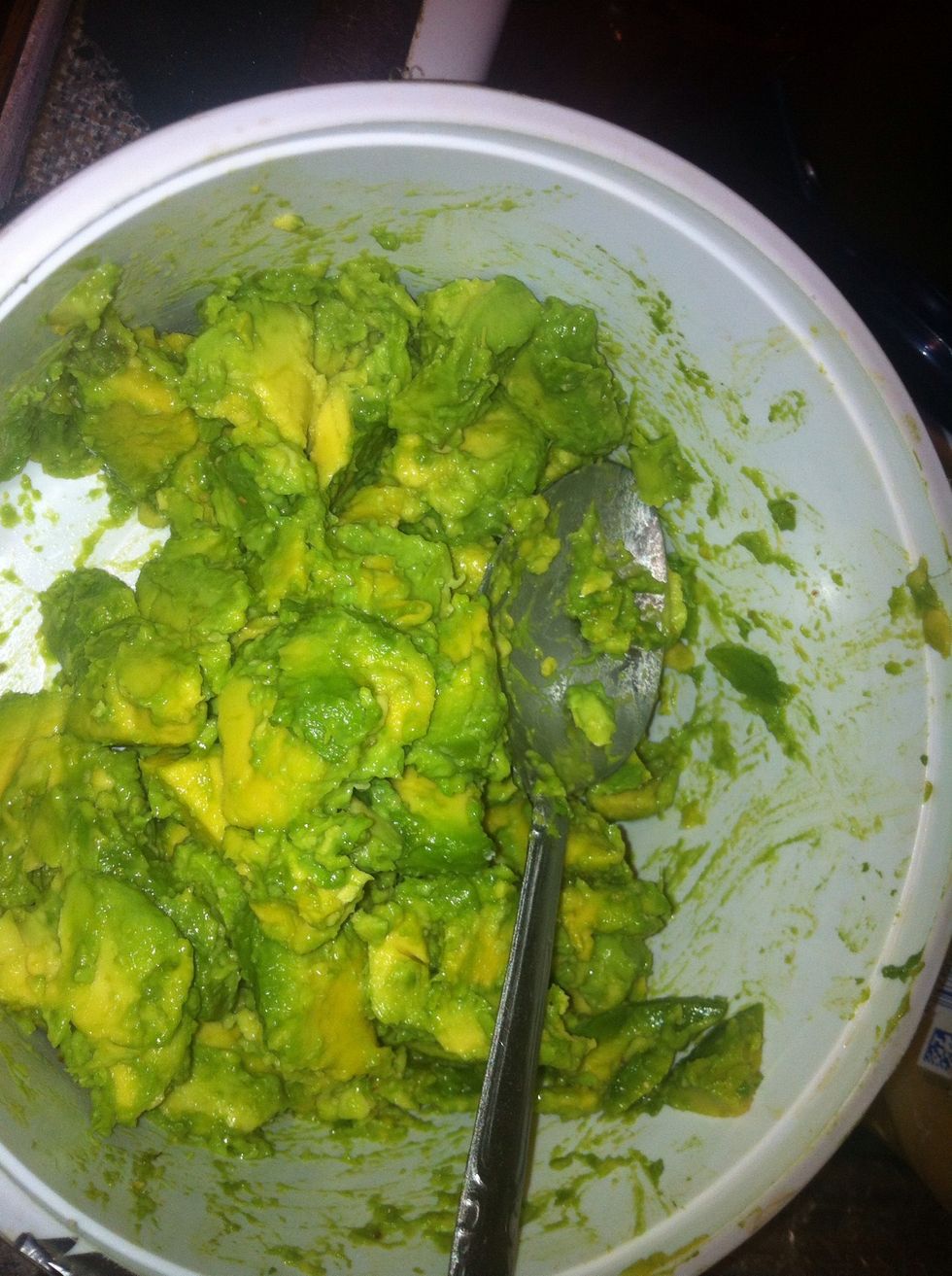 In a bowl, cut up your avocado and smoosh them up to preferred consistency. I like mine kinda chunky. Add salt.
