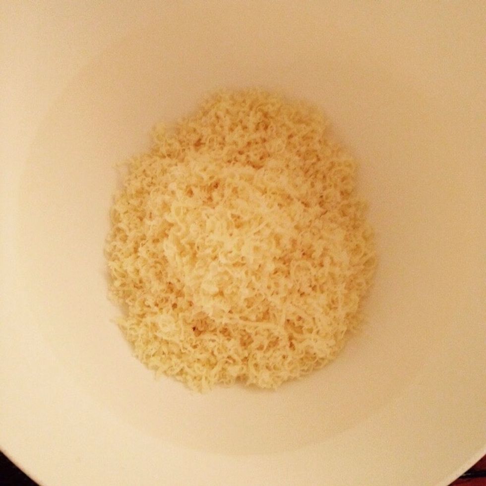 In a bowl grate the Emmental cheese