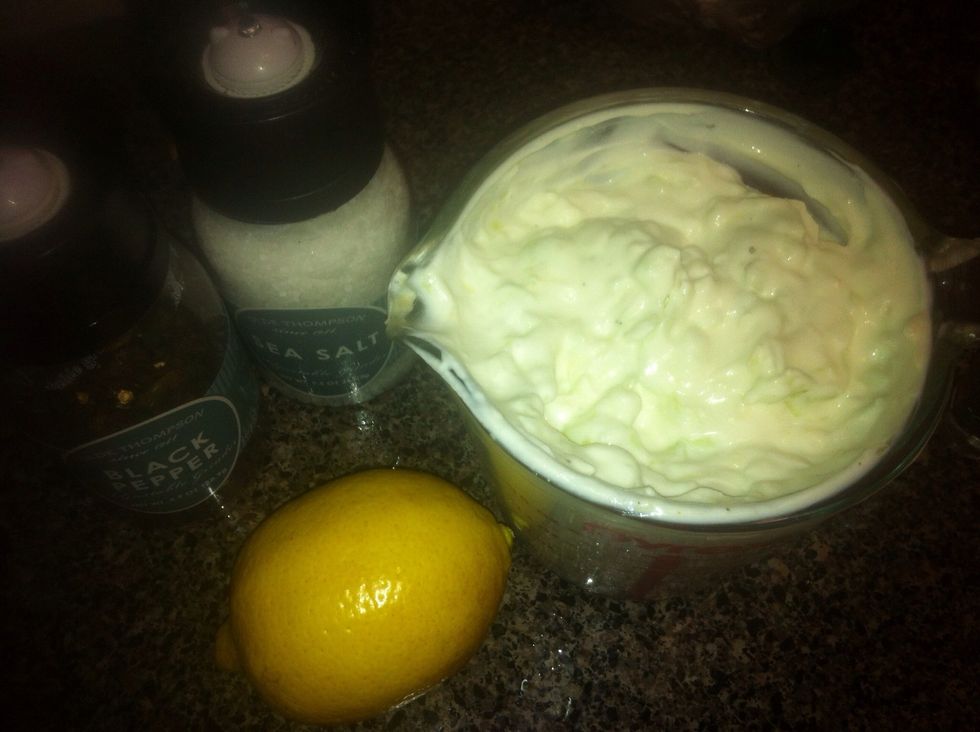 In a bowl (I used a measuring cup,) combine Greek yogurt, cucumber peels, lemon juice, garlic and sour cream.