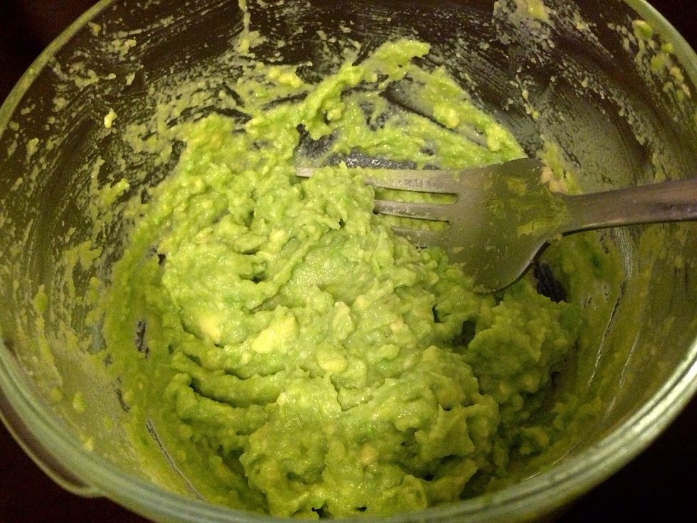In a bowl, mash the avocado with a fork until all the clumps are gone.