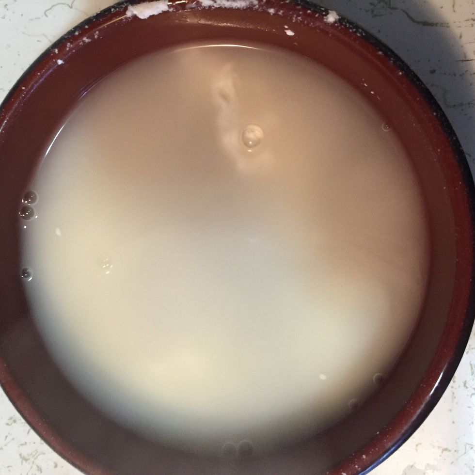 In a bowl, mix 1/4 cup of water with 2 table spoon of corn flour.