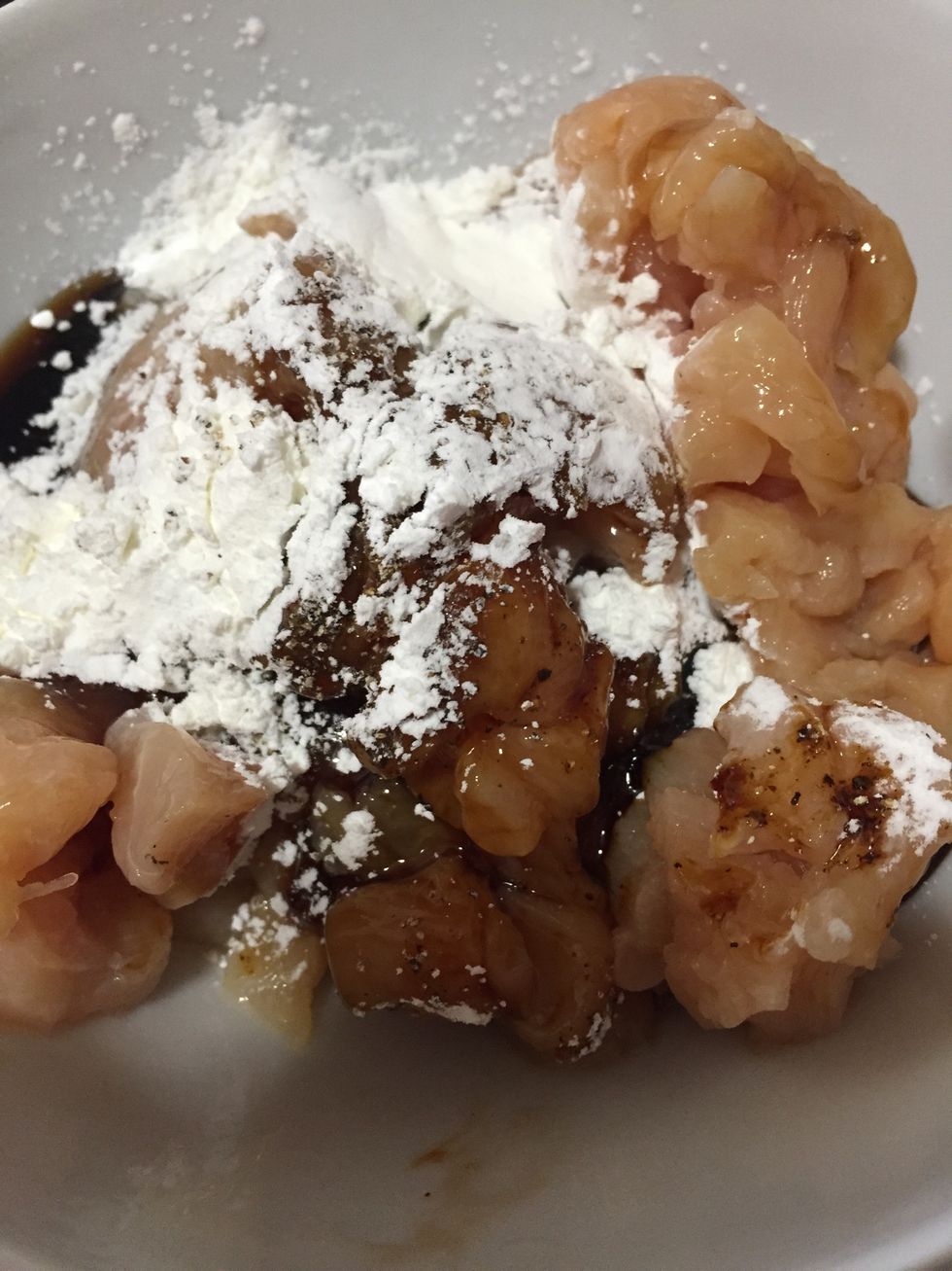 In a bowl, mix 2 tablespoon oyster sauce, corn starch, and a pinch of salt & black pepper. Leave it aside for 5-10 min.