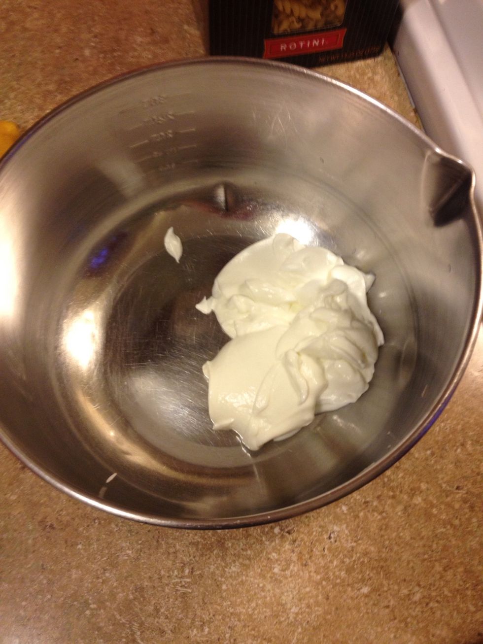 In a bowl mix 3/4 low fat sour cream