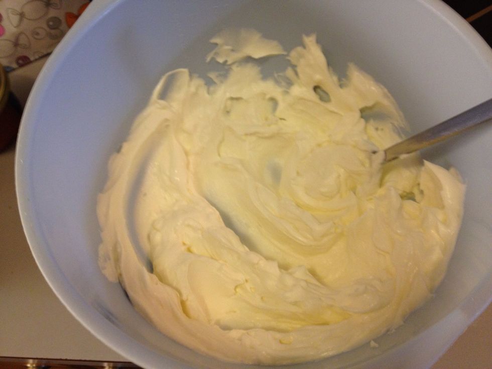 In a bowl, mix curd cheese and cream cheese.