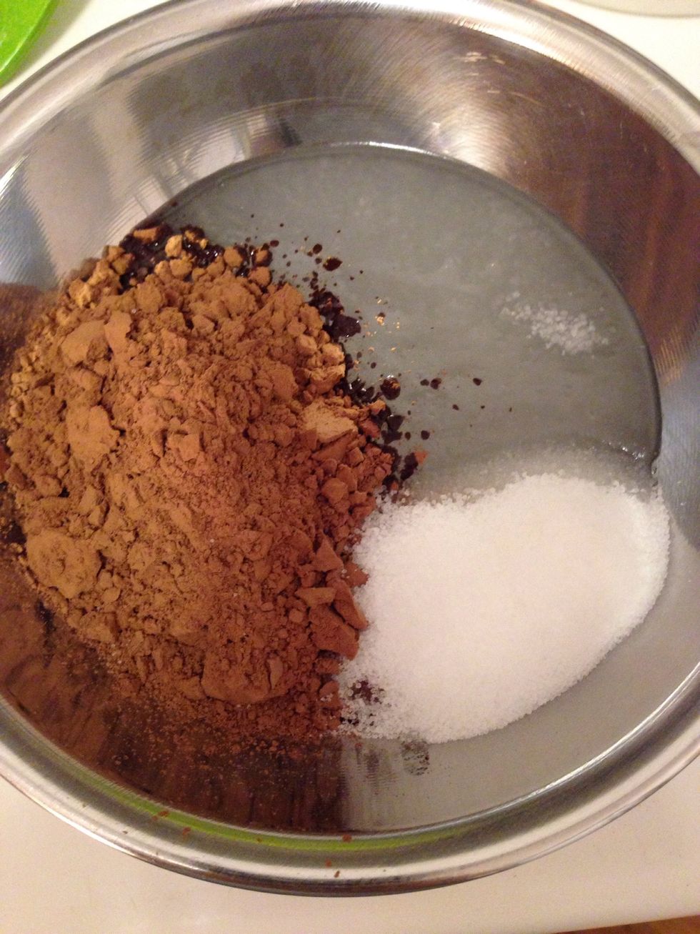 In a bowl, mix melted coconut oil, cocoa powder, ground Truvia, and salt. Make sure you grind the Truvia or else your chocolate will have a "crunch" when you bite into it.