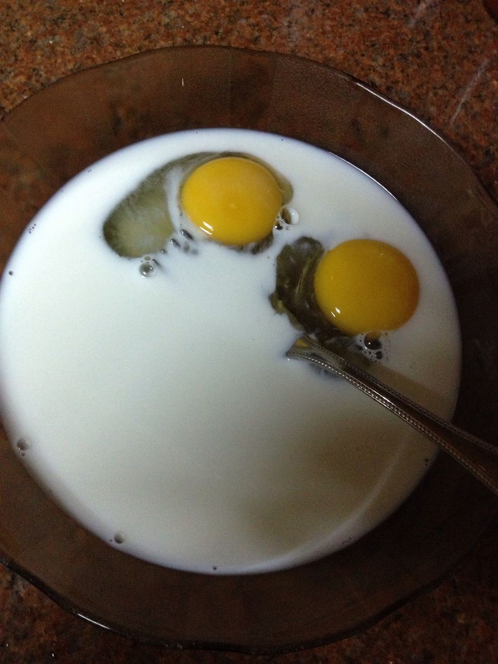 In a bowl mix the eggs and the milk