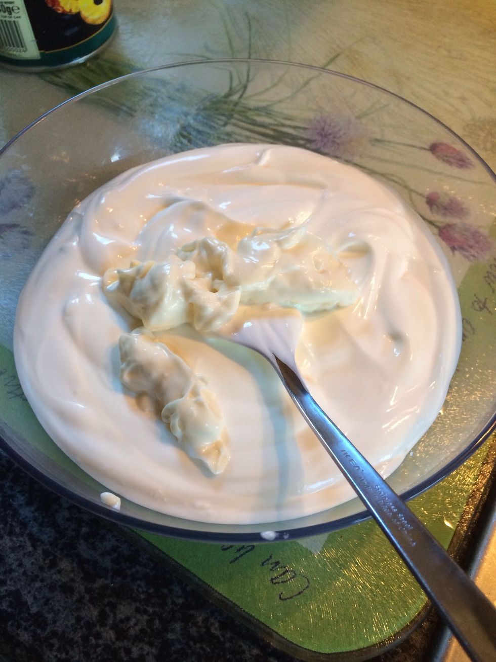In a bowl mix yogurt, mayonnaise, salt and lemon juice.