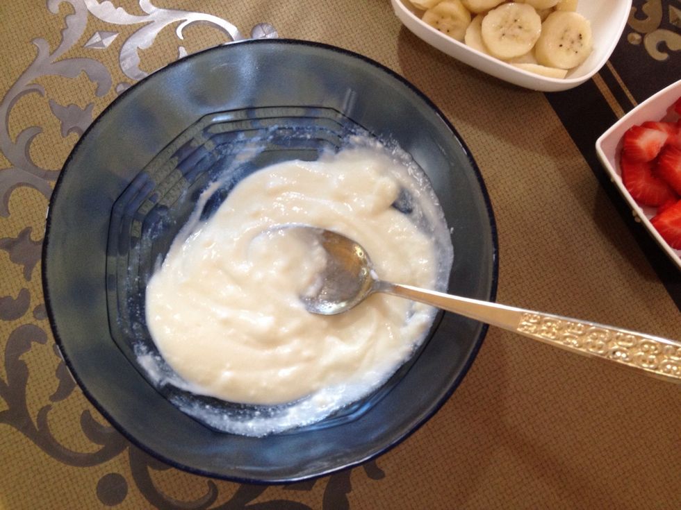 In a bowl, whisk the yogurt to get a creamy texture.