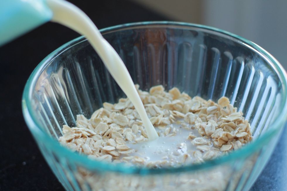 In a bowl with a lid, mix the oats and milk. Make sure the oats are well covered by the milk (they will soak it all up). Cover, and let sit in the fridge overnight (yep that's the 'overnight' part..)