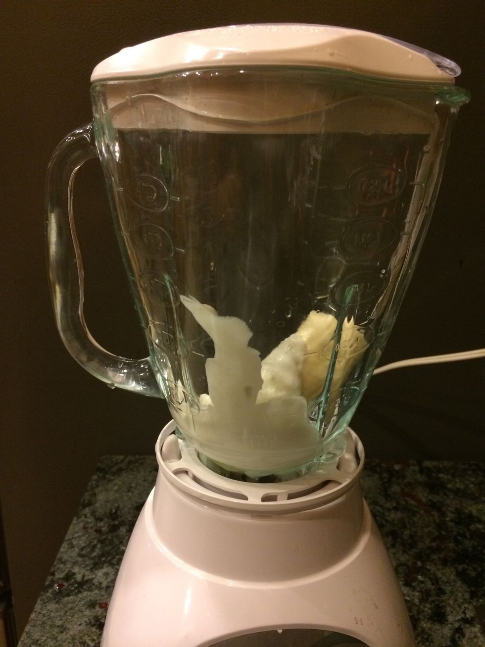 In a clean blender, blend the banana, a cup of yogurt and a tablespoon of lemon juice together until smooth. Pour this white mixture on top of the cherry-strawberry layer.