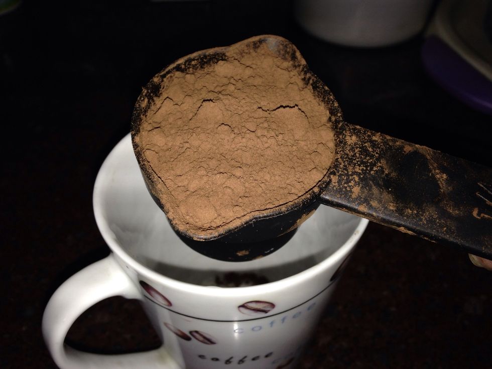 In a cup add coco powder and then add little amount of milk to make paste