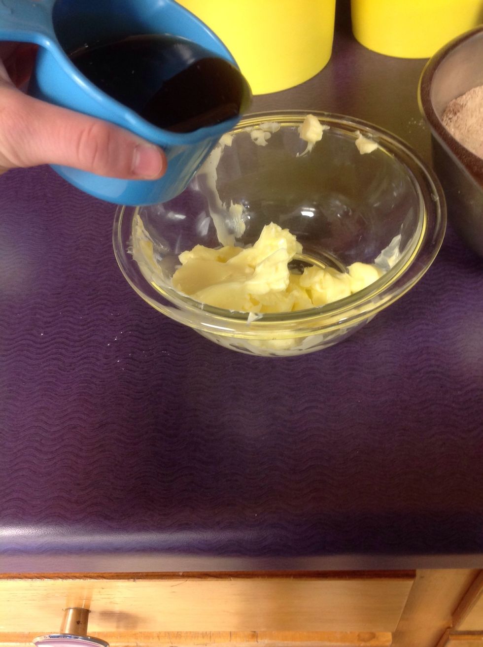 In a different bowl, add butter and stir still smooth and fluffy