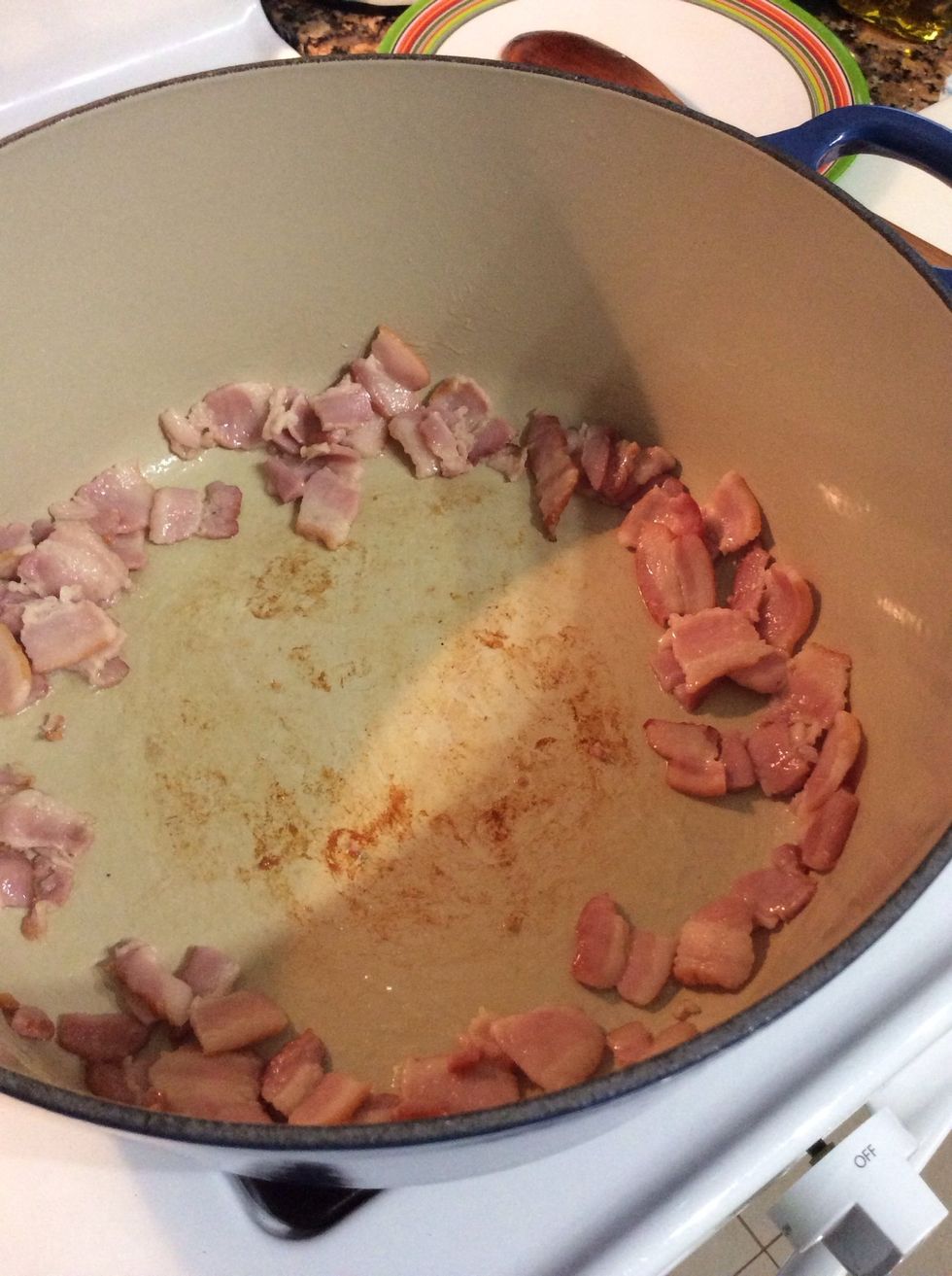 In a Dutch oven pot or heavy deep pot, cook bacon till crispy; set bacon aside and add bacon grease to a 1/2 measuring cup.Add vegetable oil to bacon grease to equal out 1/2 cup.