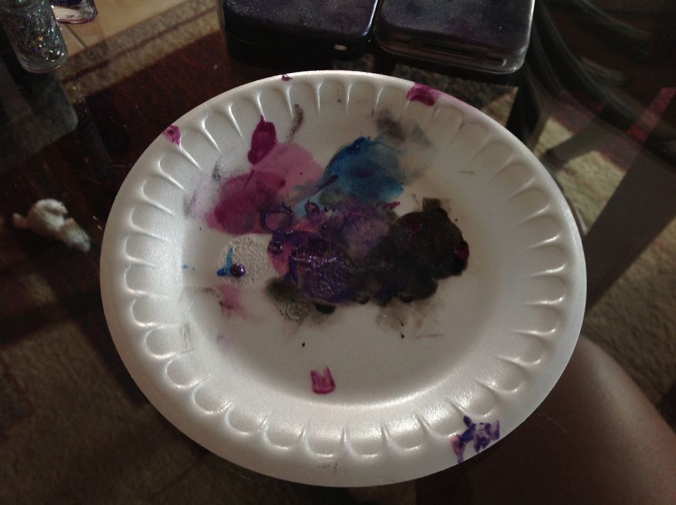 In a Foam or disposable plate our small amounts of your base colours (black and grey) and bad them on to the case cover the surface of the case.