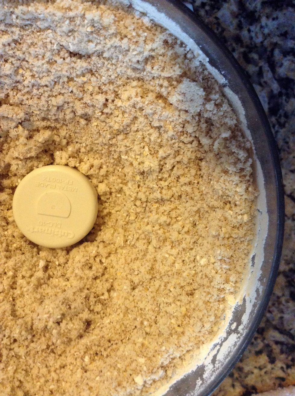 In a food processor add: 1 1/2 stick cold butter, 2 c flour, 3/4 c dark brown sugar (could use light as well) 1 cup oats and pinch of cinnamon and salt. Blend until looks coarse