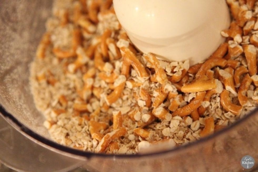In a food processor add pretzels and oats then blitz