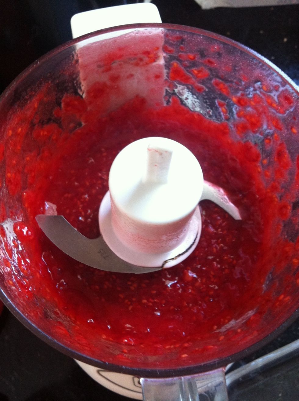 In a food processor, blend 2 tsp of sugar with 3 oz (about 15) raspberries.