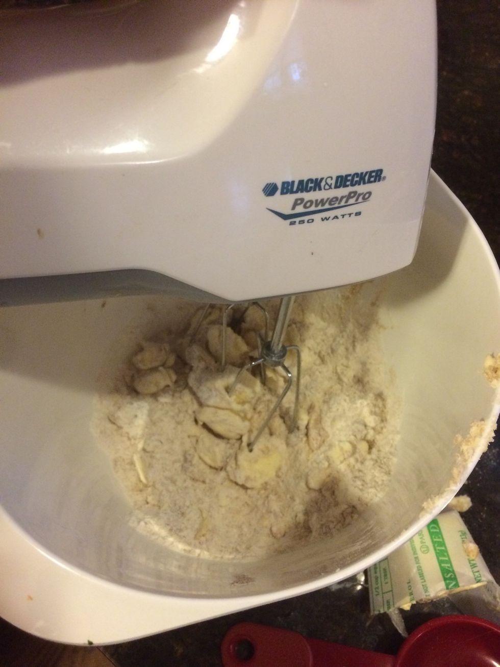 In a food processor or with mixers blend together the mixture on a low speed. The mixture may not look like dough yet- that's okay!