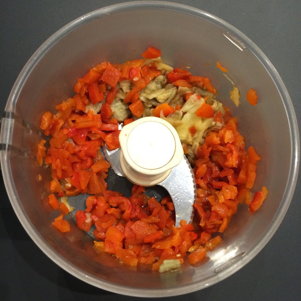In a food processor, put bell peppers, aubergine and garlic.! reduce to a pur\u00e9e.