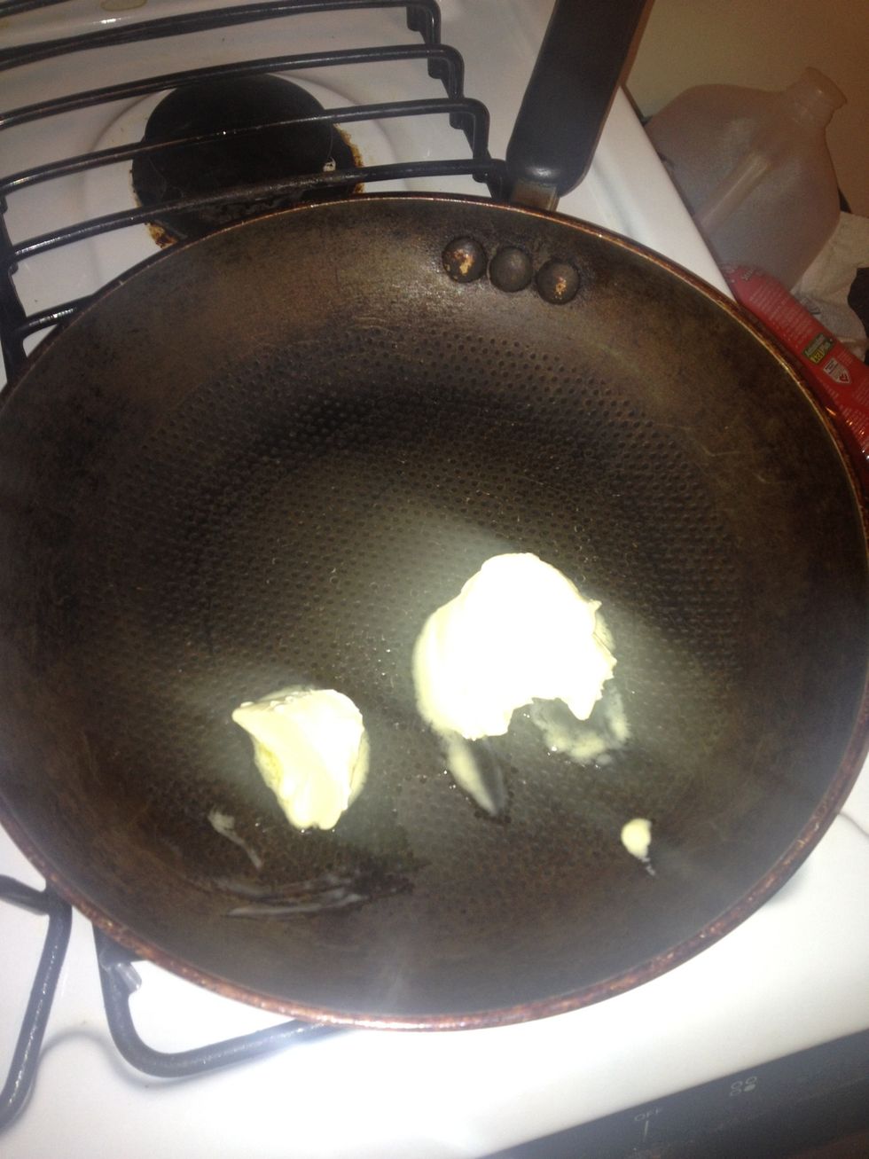 In a frying pan melt butter