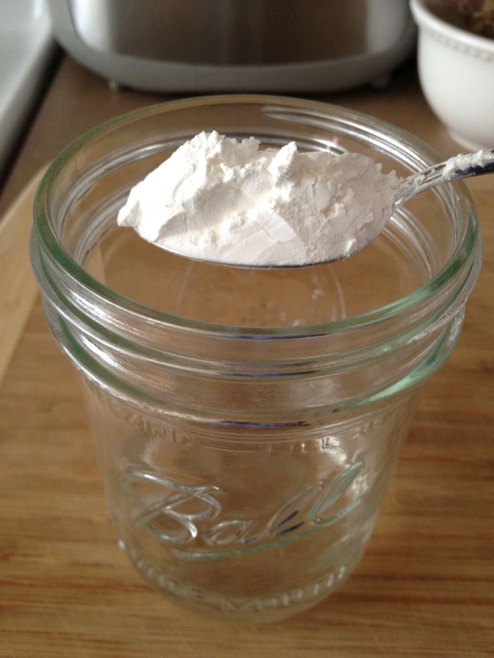 In a glass jar mix 1 tablespoon of corn starch to 1/2 cup of water and add to syrup. Bring to a boil and remove from heat with a final mix..