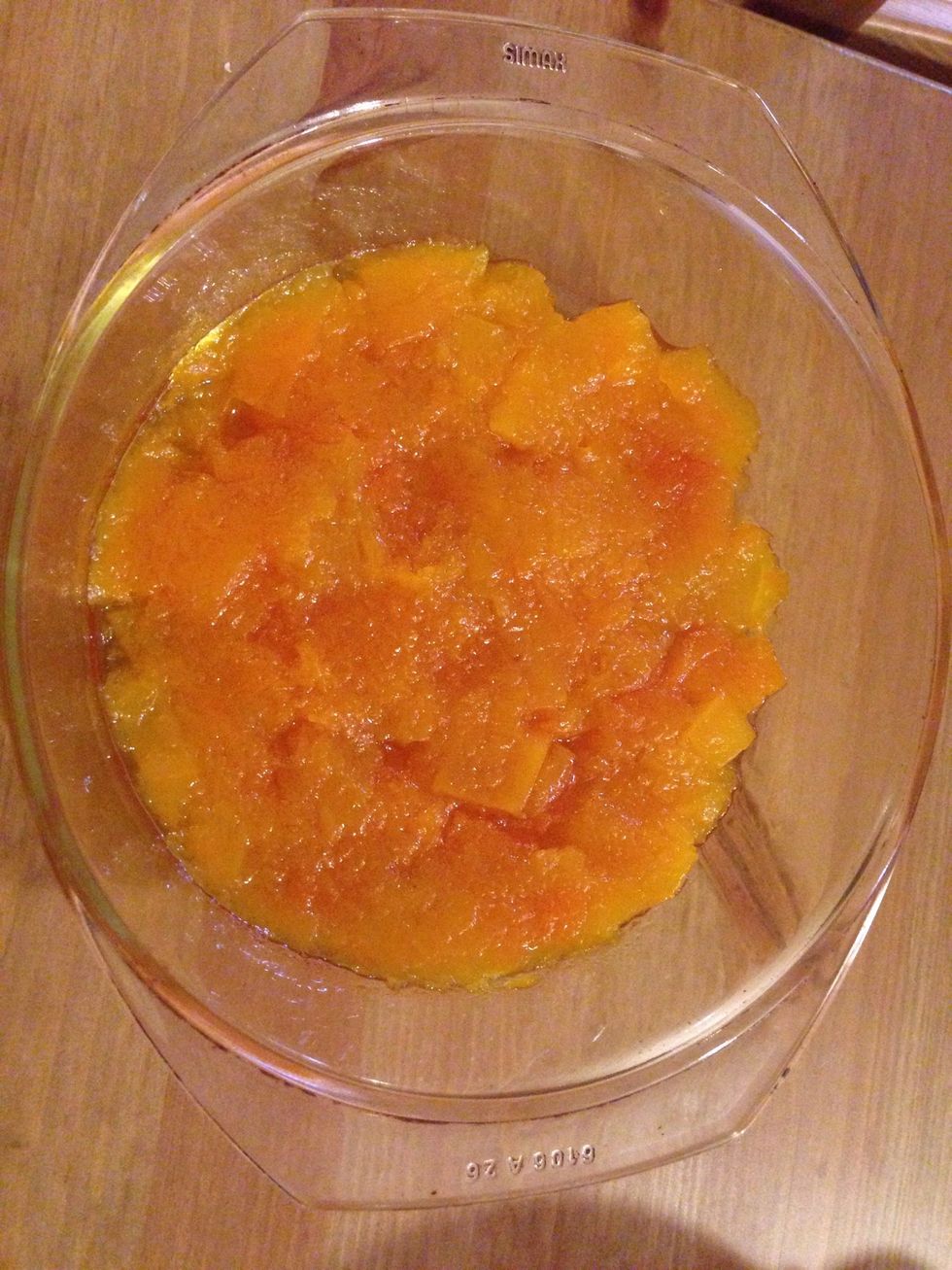In a glass pan put the1/2 pumpkin