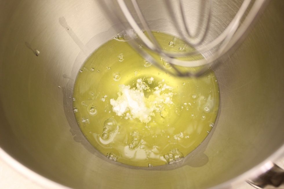 In a GREASE FREE stand mixer fitted with a whisk attachment, mix together the 7 egg whites and cream of tartar to make a stiff meringue.