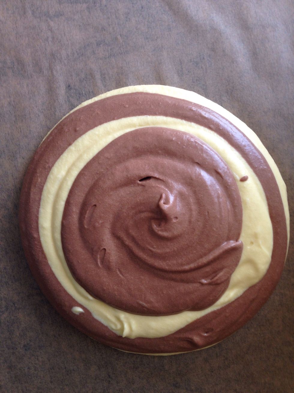 In a greased pan step by step put 2 tbspoon of each batter