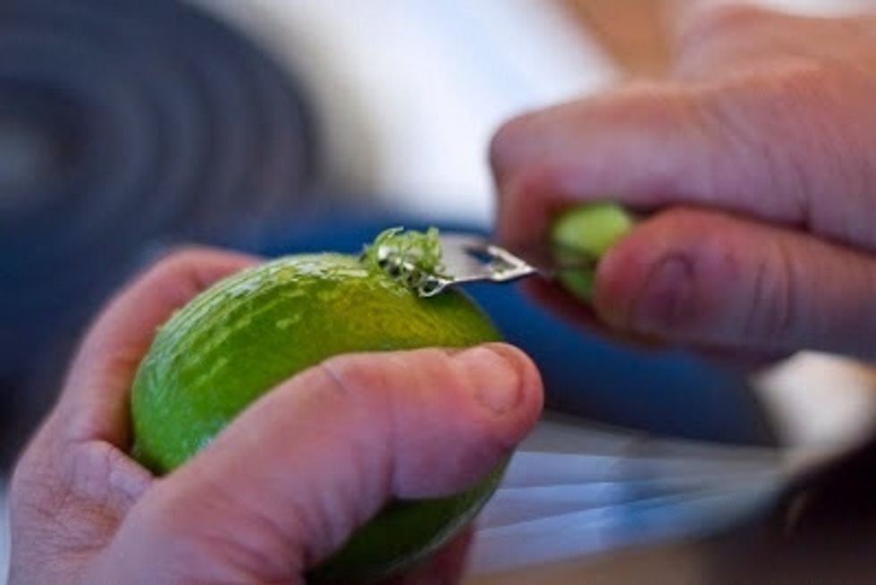 In a heavy pot mix together: 1/3 cup of cream, 1 and 1/2 tsp of lime zest