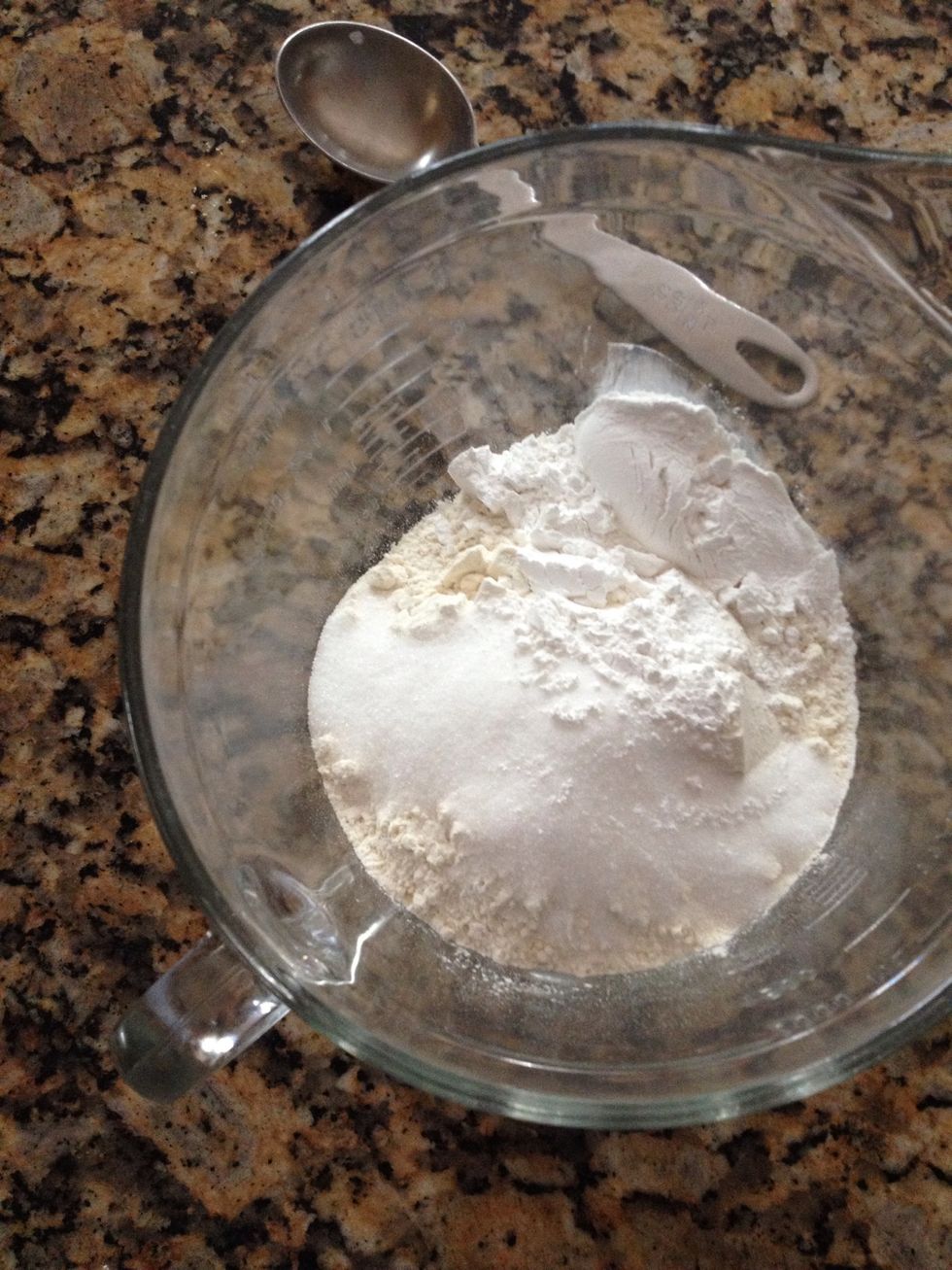 In a large bowl: 2 cups bread flour, 1/4 cup sugar, 1/4 cup baking powder