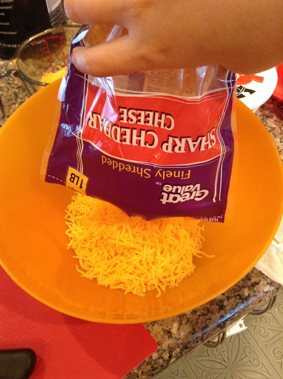 In a large bowl, add 3.75 cups of cheddar cheese.