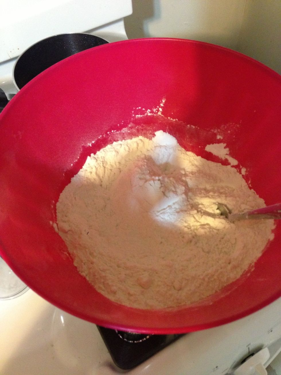 In a large bowl, add the flour, salt & baking powder. Mix all of these ingredients together.