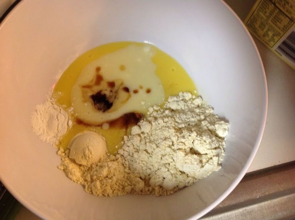 In a large bowl, beat eggs and sugar until thick. Stir in the melted butter and vanilla. Sift together the flour and baking powder, and blend into the batter until smooth