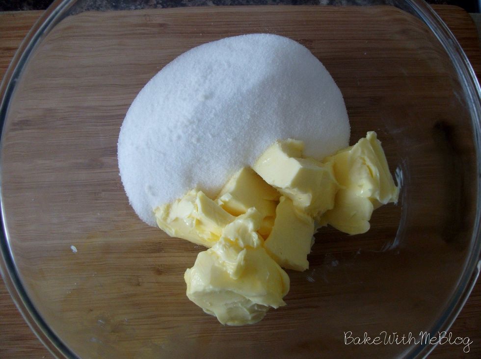 In a large bowl, beat the butter and sugars together, then beat in eggs and vanilla extract, vanilla essence . The coarseness of the sugar granules will help break the butter down.