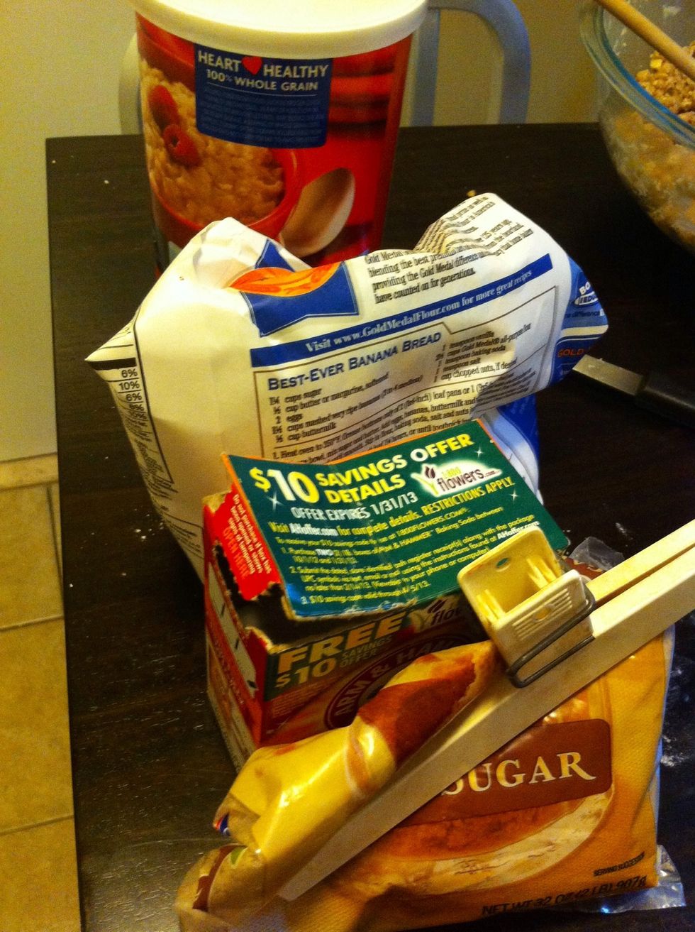 In a large bowl combine 2 cups of flour, 2 cups quick cooking oats, 1 1/2 cups packed brown sugar, and 1 teaspoon of baking soda