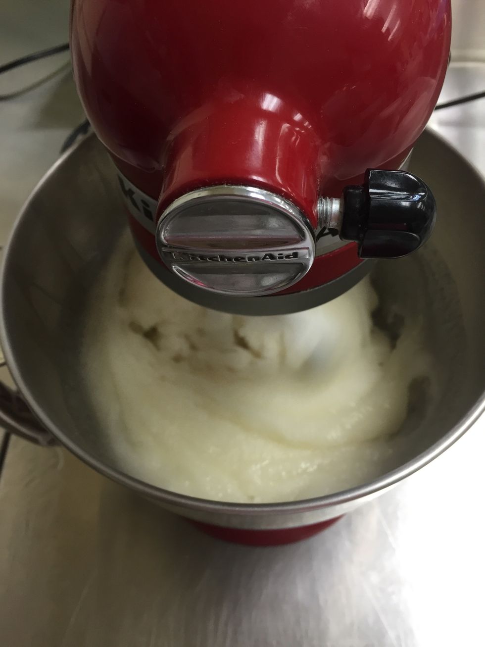 In a large bowl, combine sugar and oil until blended