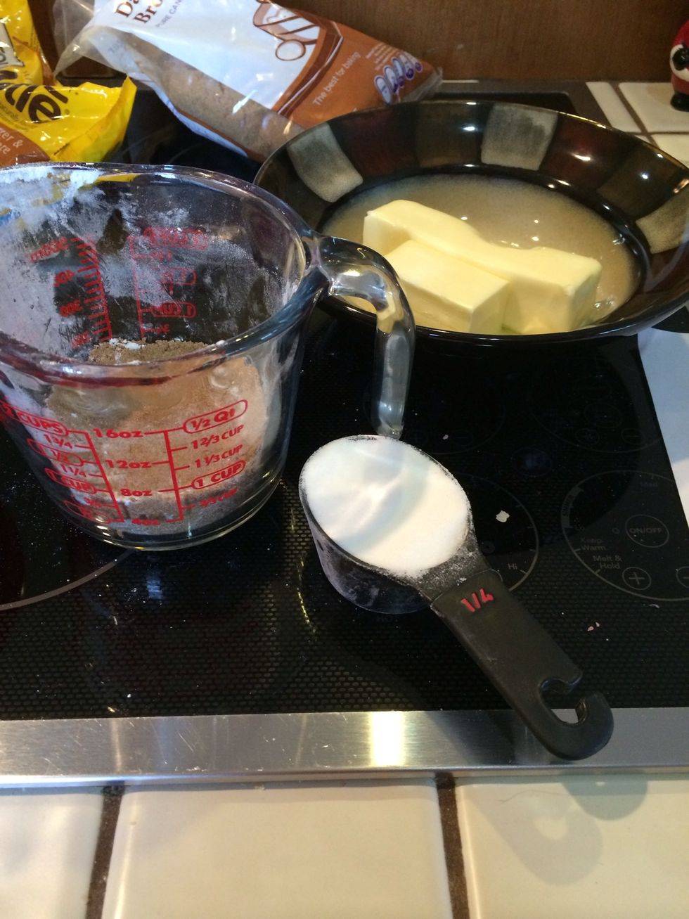In a large bowl, combine the brown sugar (3/4c.), white sugar (1/4c), and butter (1 stick).