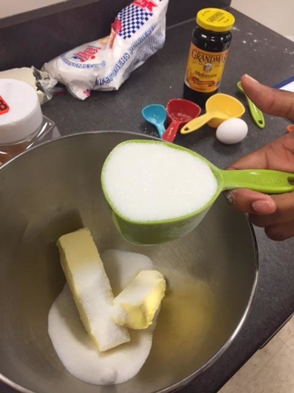 In a large bowl, cream together the margarine and 1 cup sugar until light and fluffy