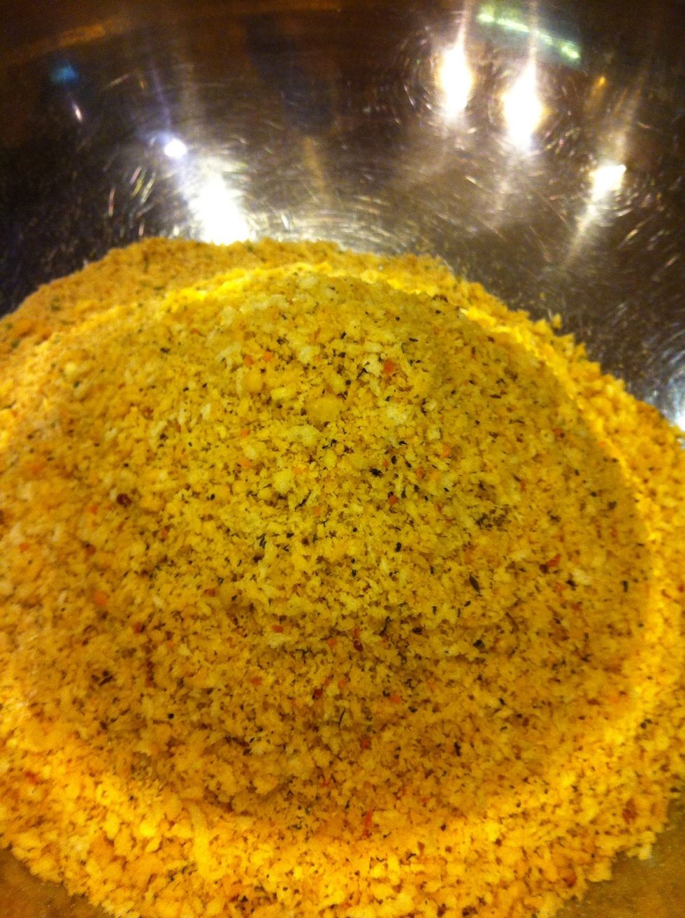 In a large bowl, pour breadcrumbs into..I use seasoned breadcrumbs and panko.