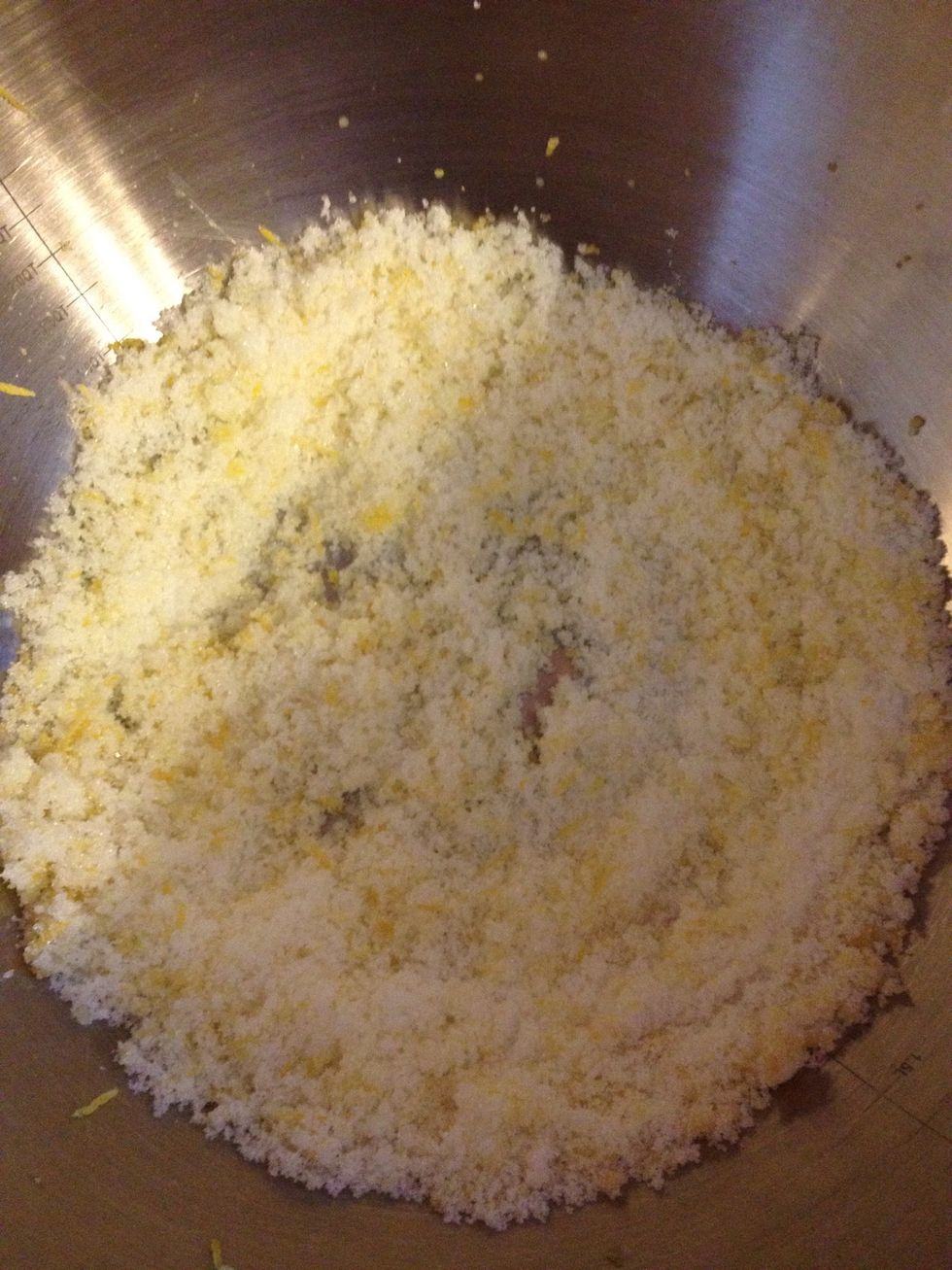 In a large bowl, rub together sugar & lemon rind until fragrant & well blended.