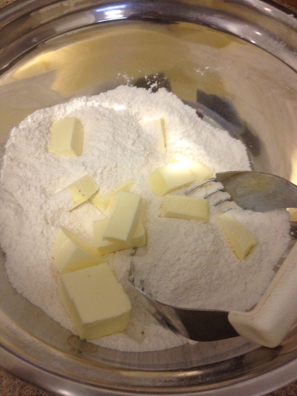 In a large bowl, whisk together flour, sugar, baking powder and salt. Rub butter into flour mixture.