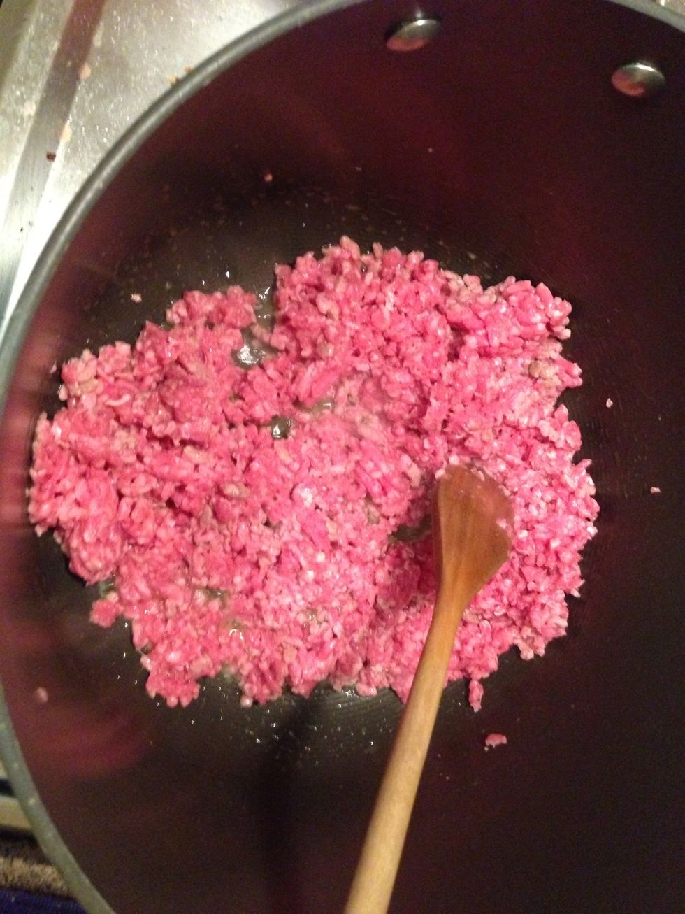 In a large heavy-bottomed pot, add 2 tablespoons of extra-virgin olive oil and brown the veal.