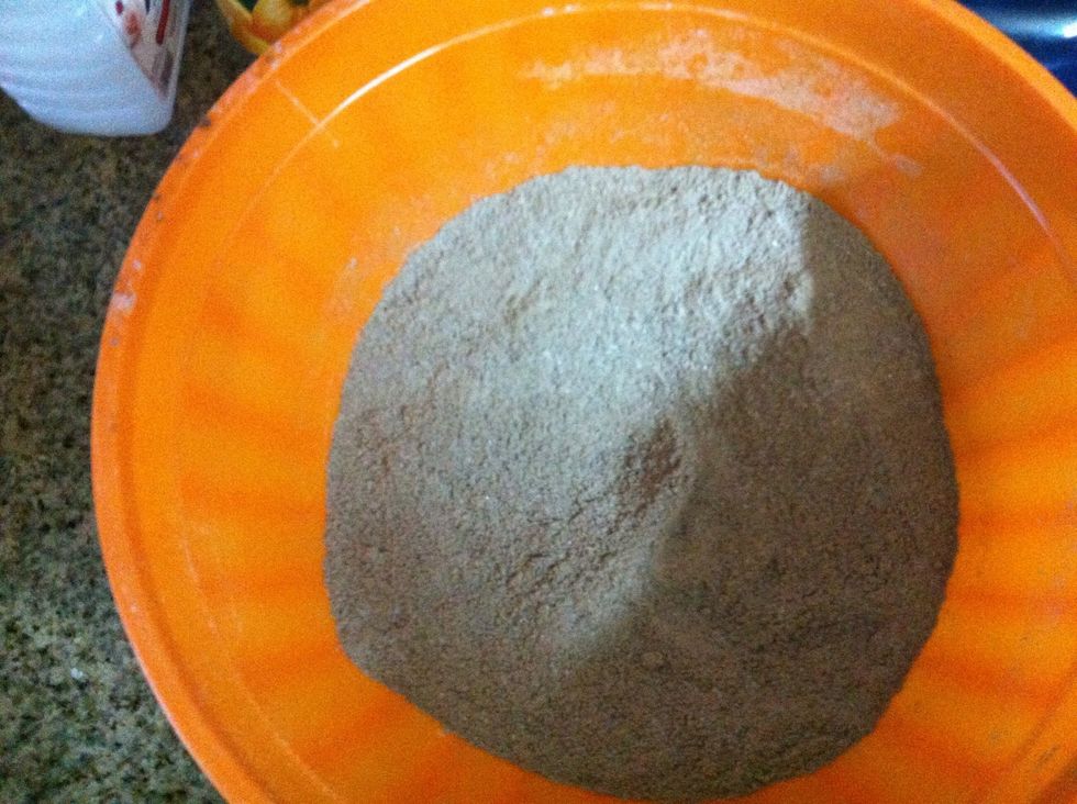 In a large mixing bowl, sift together the flour, cocoa powder, baking powder, baking soda and salt. Add the sugar and combine. Set aside.