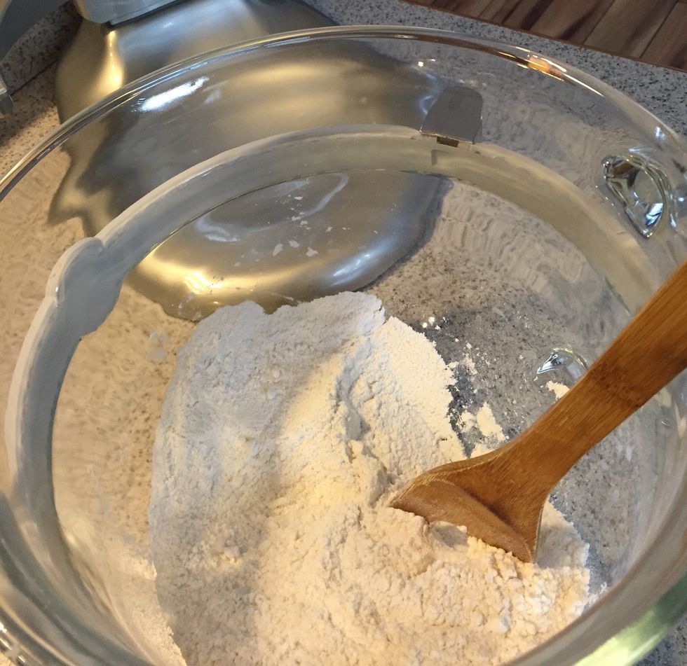 In a large mixing bowl, swift together all dry ingredients, with the exception of the brown sugar.