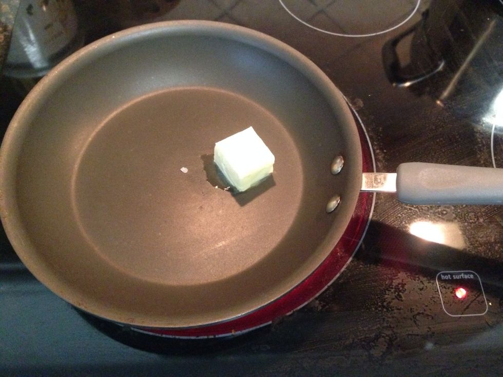 In a large non stick skillet over med / high heat melt the 2 Tbsp butter.