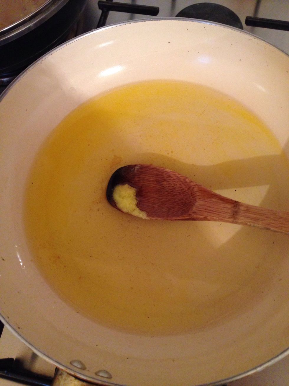 In a large pan melt in the oil and the butter